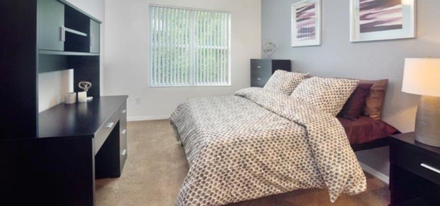 An example of a furnished bedroom at an apartment near FSU