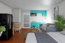 Explore this contemporary studio designed for comfort, with a vibrant kitchen and cozy seating area.
