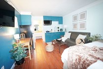 Welcome to your cozy studio retreat, complete with modern amenities and inviting decor.