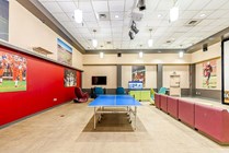 Unwind in this lively recreation room, perfect for entertainment and relaxation.